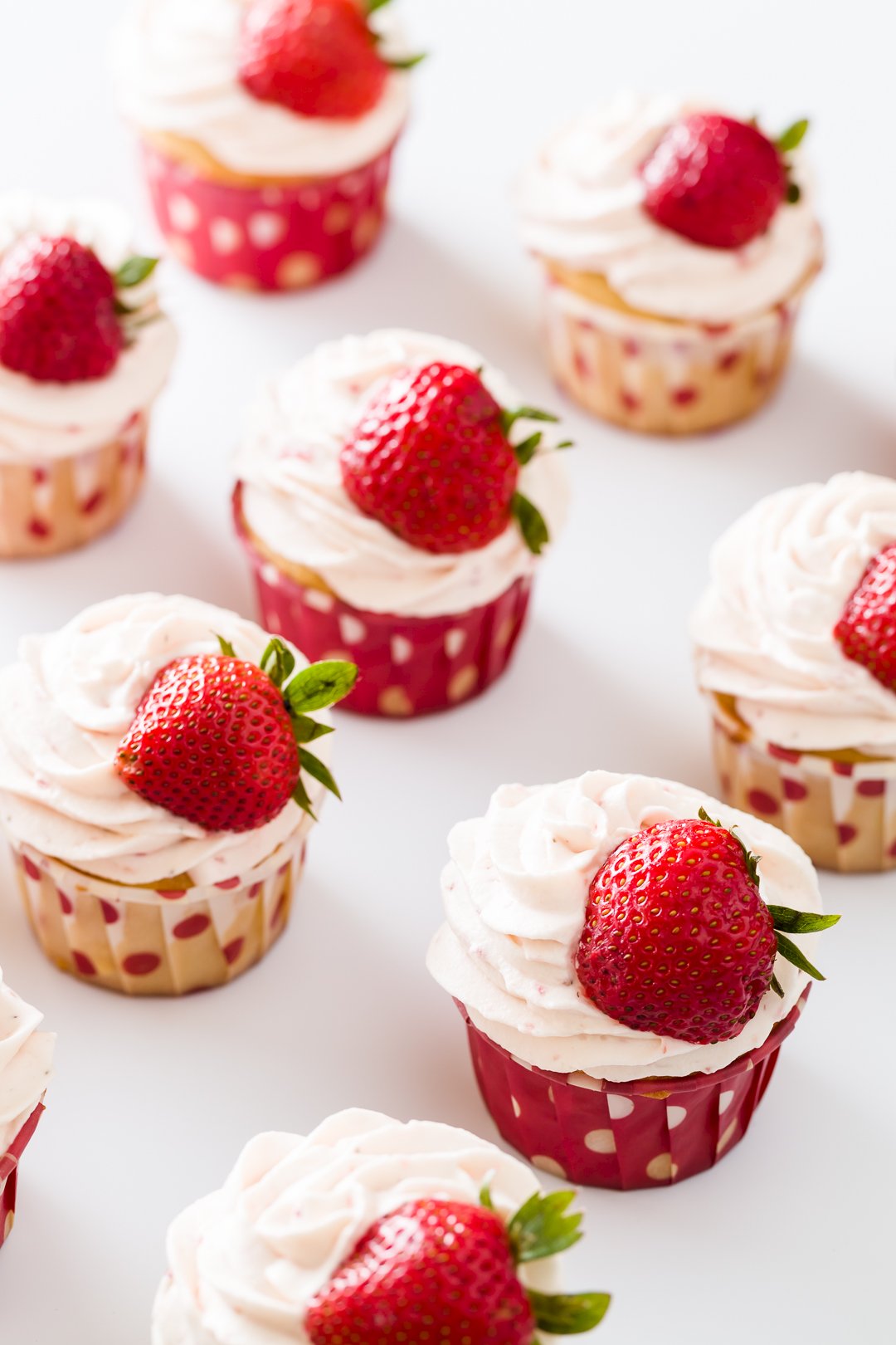 Vanilla Cupcakes with Strawberry Whipped Cream Frosting | Cupcake Project
