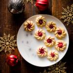 Spritz Cookies on a plate decorated for Christmas