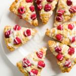 A plate filled with raspberry scones