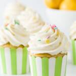 Cupcakes with sprinkles in green striped wrappers
